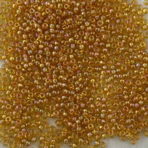 TOHO Seedbeads 9/0, Gyllen Tranparent Irislyster  815B