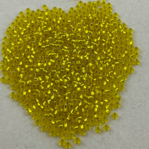 TOHO Seedbeads 11/0,  NR 66   Gul Silver Line