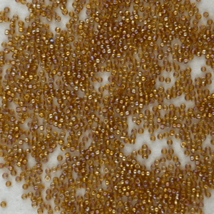 TOHO Seedbeads 15/0, NR 815 B Gyllen Transparent  Iris Lyster CA 10 GRAM